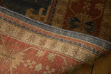 Close-up of the hand-knotted Indian Bijar carpet's intact side cord selvage and woven foundation.