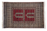 Vintage Pakistani Turkmen rug with a double niche prayer design in cherry red, silver, and black.