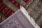 View of the tightly woven foundation and secure selvage on a vintage Pakistani Turkmen rug.