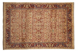 Vintage Indian Bijar design carpet with a floral lattice on a gold field and a red palmette border.