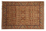 Vintage Indian Bijar design carpet with a red and blue floral lattice over a dusty gold field.