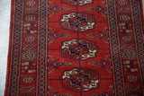 The dense, full pile and high sheen of the hand-knotted wool on a vintage Bokhara rug.