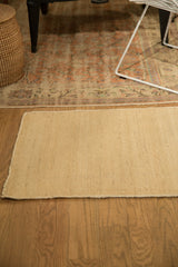 Amber Jute hand-woven rug edge, highlighting its natural blanched texture.