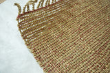 Hand-woven natural fiber rug mat, beige seagrass jute blend, reddish stripes, 2' x 3'.