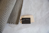 Beige and grey herringbone pattern on a tightly woven Dawn carpet sample.