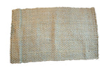 Chunky woven Elsa Jute rug in natural beige with subtle blue-gray tones, 2'6