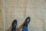 Elsa Jute rug's chunky woven texture displaying natural blue-gray tones.