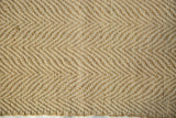 Textured herringbone weave of the natural seagrass Luna New Carpet Collection rug.