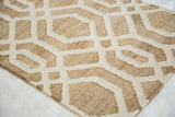 Textured hand-woven geometric pattern of a Nya New Carpet in natural jute and viscose.