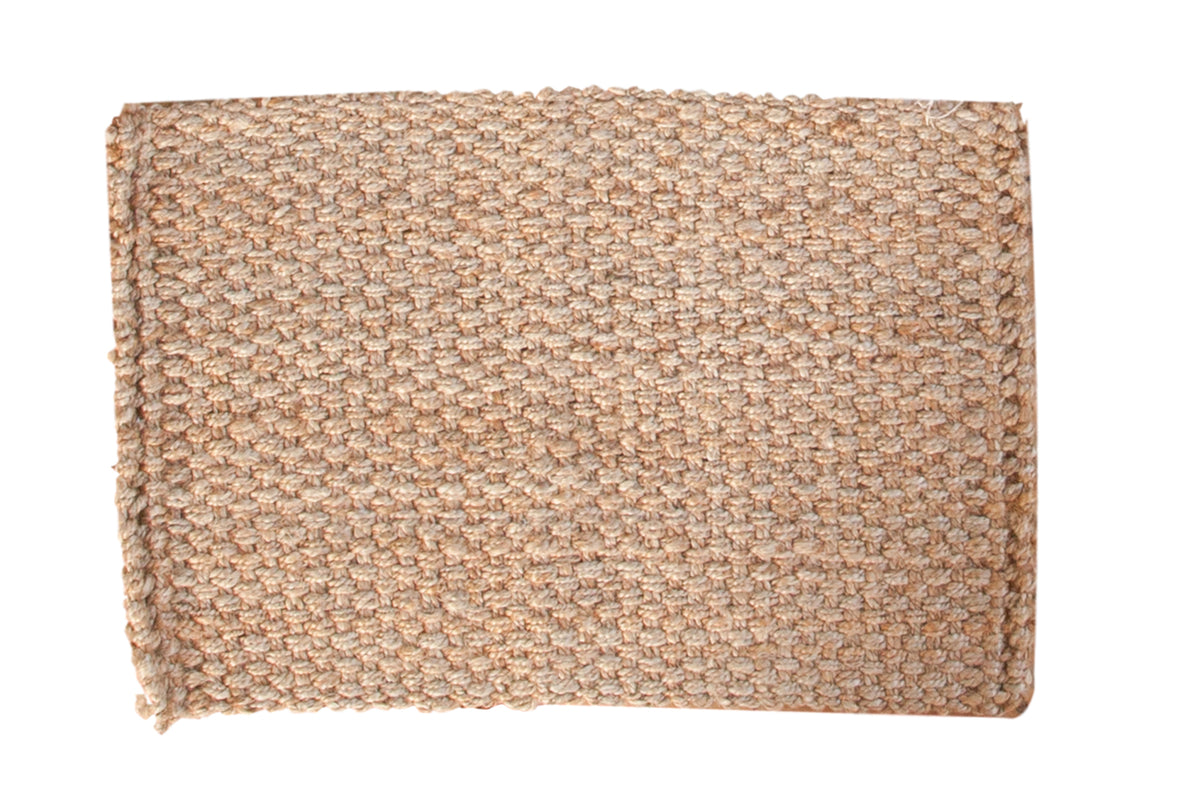 Saratoga jute rug mat, hand-woven with chunky natural texture, 2' x 3' size.