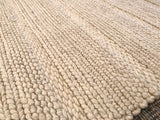 Chunky undyed wool texture of the Snow New Carpet Collection rug.