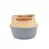 Olli Ella round gray dipped seagrass belly basket with leather handles.