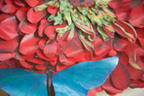 Layered dark pink flower petals and a partial vibrant blue butterfly wing.