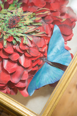 Maria Heller 3D art with blue butterfly, layered pink flower, and gold frame.