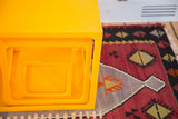 Tangerine orange retro Lucite nesting cubes, shown partially nested from overhead.