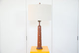 Mid Century Modern Martz teak lamp with cream drum shade and pearly inlaid dots.