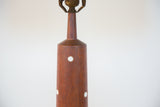 Martz lamp's upper teak base with white round inlays and brass socket.