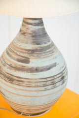 Mid Century Modern Martz lamp base with swirling blue-gray and earthy tan ceramic.