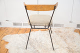 Vintage Clifford Pascoe chair, rear view, with Birchwood backrest, gray vinyl seat, black legs.