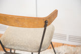 Curved Birchwood backrest and textured gray vinyl seat of the Vintage Clifford Pascoe Chair.