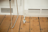 Vintage 1960s Lucite rolling cart with clear leg and chrome ball caster.