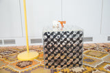 Vintage Lucite cube table with striking black checker art, 14 inches cubed.