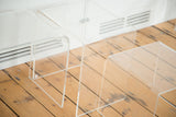 Set of three vintage Lucite side tables with subtle surface wear.