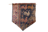 Collector early 20th century West Persian Rugling features dark blue field, vibrant rooster motifs.