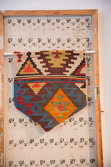 Collector hand-crafted RUGLING flag with antique Turkish Kilim fragment, geometric patterns in green, blue, red.