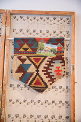 Circa 1920 antique Turkish kilim fragment cork board flag, geometric green and brown.