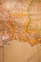 Faded canvas detail of the antique map, showing the Texas-Louisiana Gulf Coast.