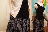 Vintage 50s French black velvet two-piece ensemble with rose-patterned fringed skirt.