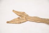Intricate patterns and textured surface of the vintage bronze snake sculpture.