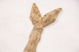 Vintage bronze double snake's bifurcated end, showing rough texture and aged patina.