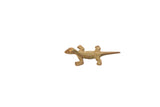Vintage African bronze lizard gold weight with a textured, oxidized patina.