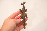 Collectible vintage bronze African crocodile sculpture, showing detailed textured belly.