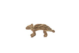 Vintage bronze porcupine gold weight with textured quills and an oxidized blue patina.