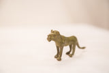 Vintage handmade African bronze lioness sculpture with rich, aged patina.