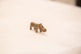 Front three-quarter view of the tiny vintage hippo bronze sculpture.