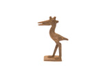 Vintage handmade bronze pelican sculpture with a dark, iron-like patina.
