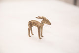 Vintage bronze impala ram in profile with a textured blue-green oxidized patina.