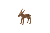 Vintage African bronze gold weight shaped like an impala ram with a dark, textured patina.
