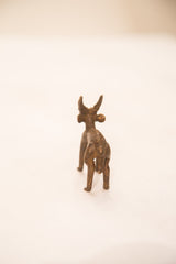 Rear view of vintage bronze impala ram with iron-like patina.