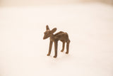Vintage Ashanti bronze gold weight sculpture of a standing female impala, seen in profile.