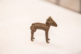Vintage dark ram bronze weight showing its full side profile and textured patina.