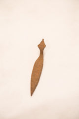 The hand-forged head of a vintage iron snake showing its unique shape and texture.
