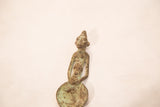 Angled view of a handmade Ashanti bronze figure with a lovely blue-green oxidized patina.