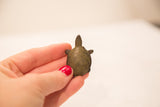 Vintage bronze turtle gold weight, intricately detailed spotted shell with green patina.