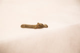 Vintage handmade bronze hippo sculpture, side view showing lying down, submerged form.