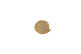 Vintage coiled snake bronze gold weight with green patina.